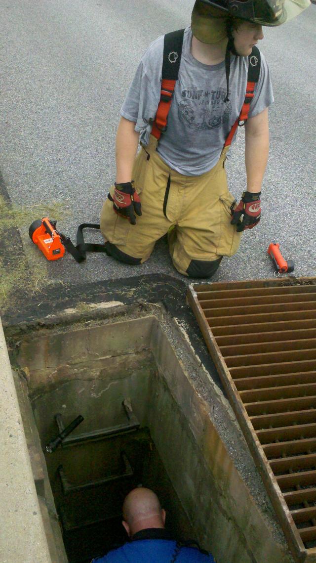 FF Bryan Baker assisting Downingtown Police with the duck rescue. 